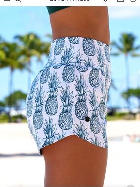 Love Fitness Apparel White and Blue Pineapple Print Athletic Shorts.